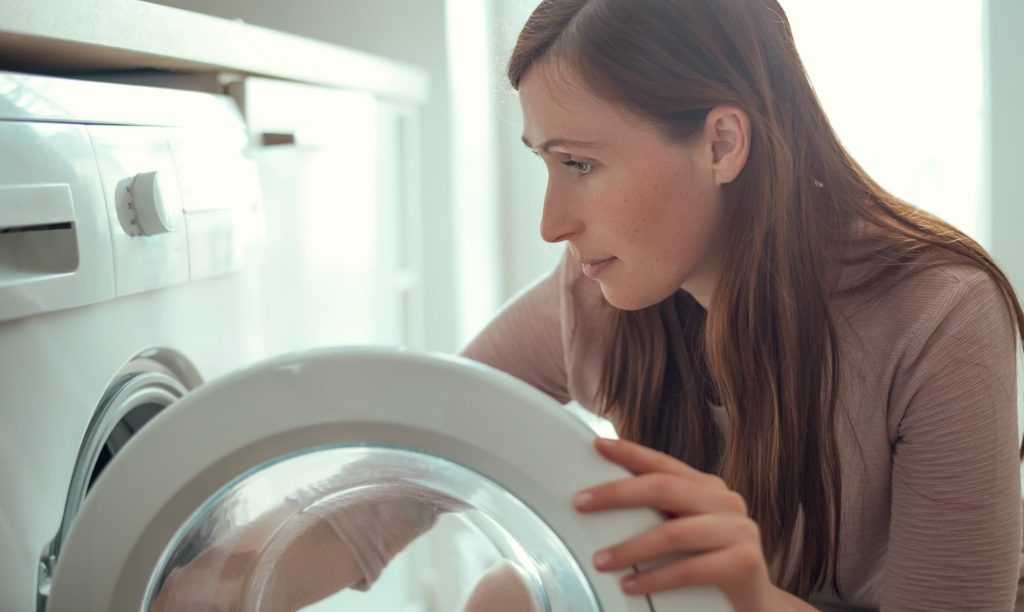 washing clothes in machine