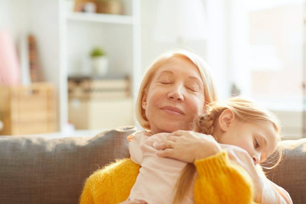 Loving Mother Embracing Daughter