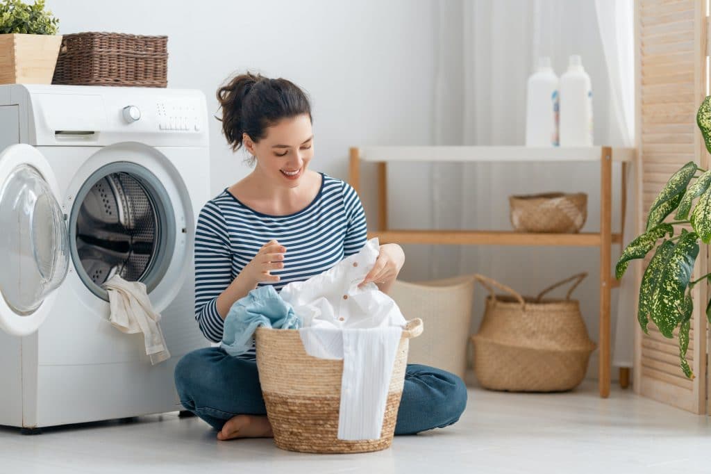 woman is doing laundry