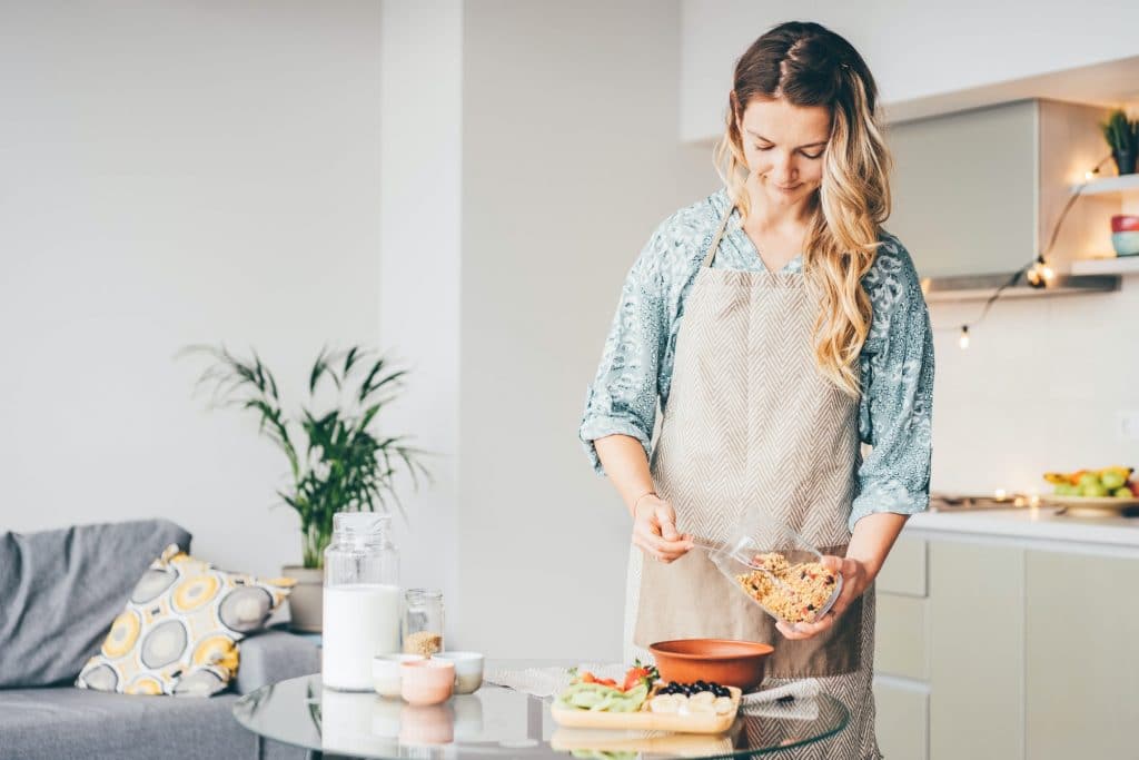 Healthy breakfast or morning snack. Woman cooking breakfast.