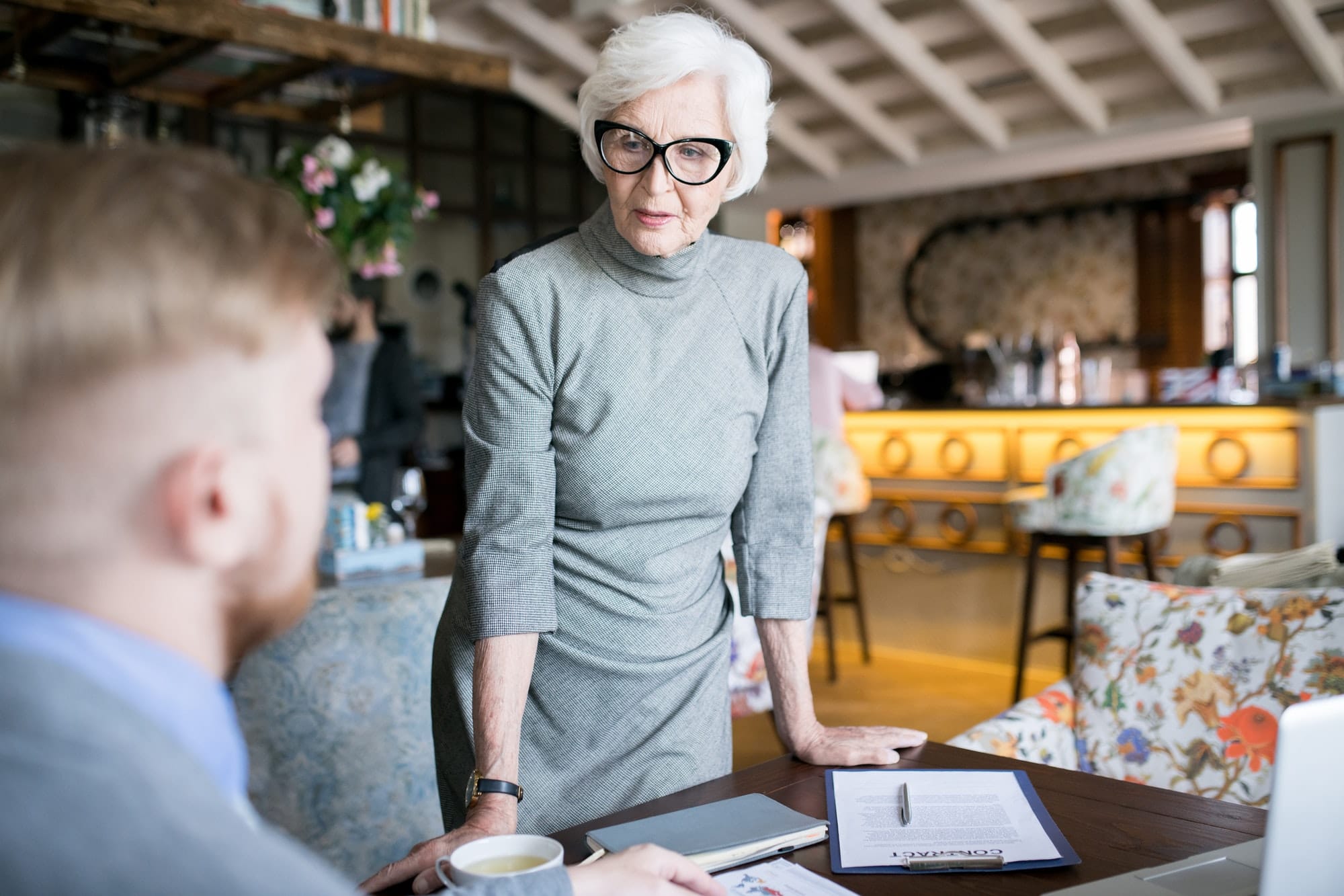 Senior leader working at the restaurant