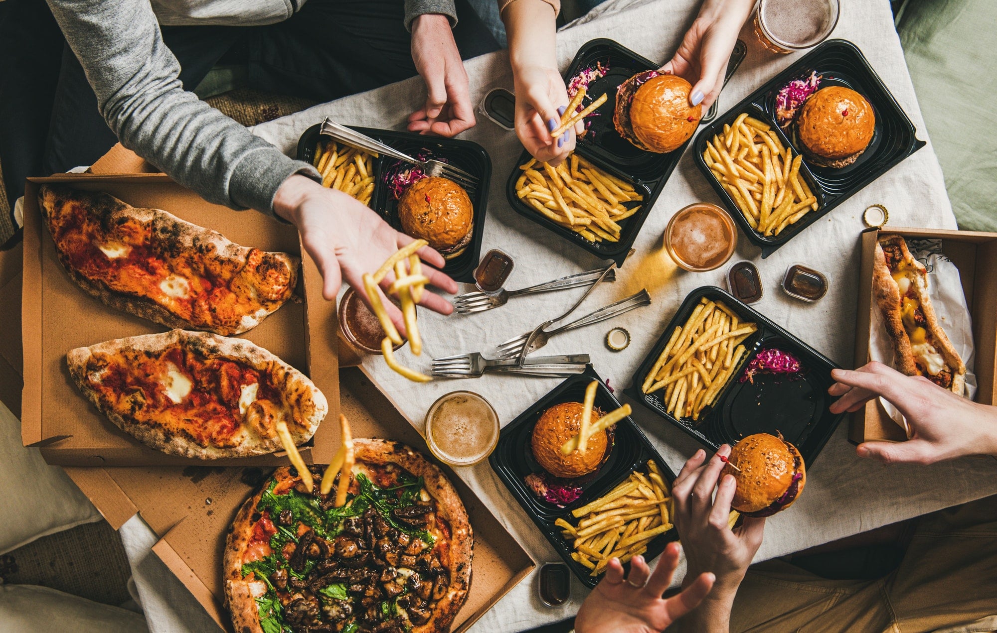 Lockdown fast food dinner from delivery service, getting together