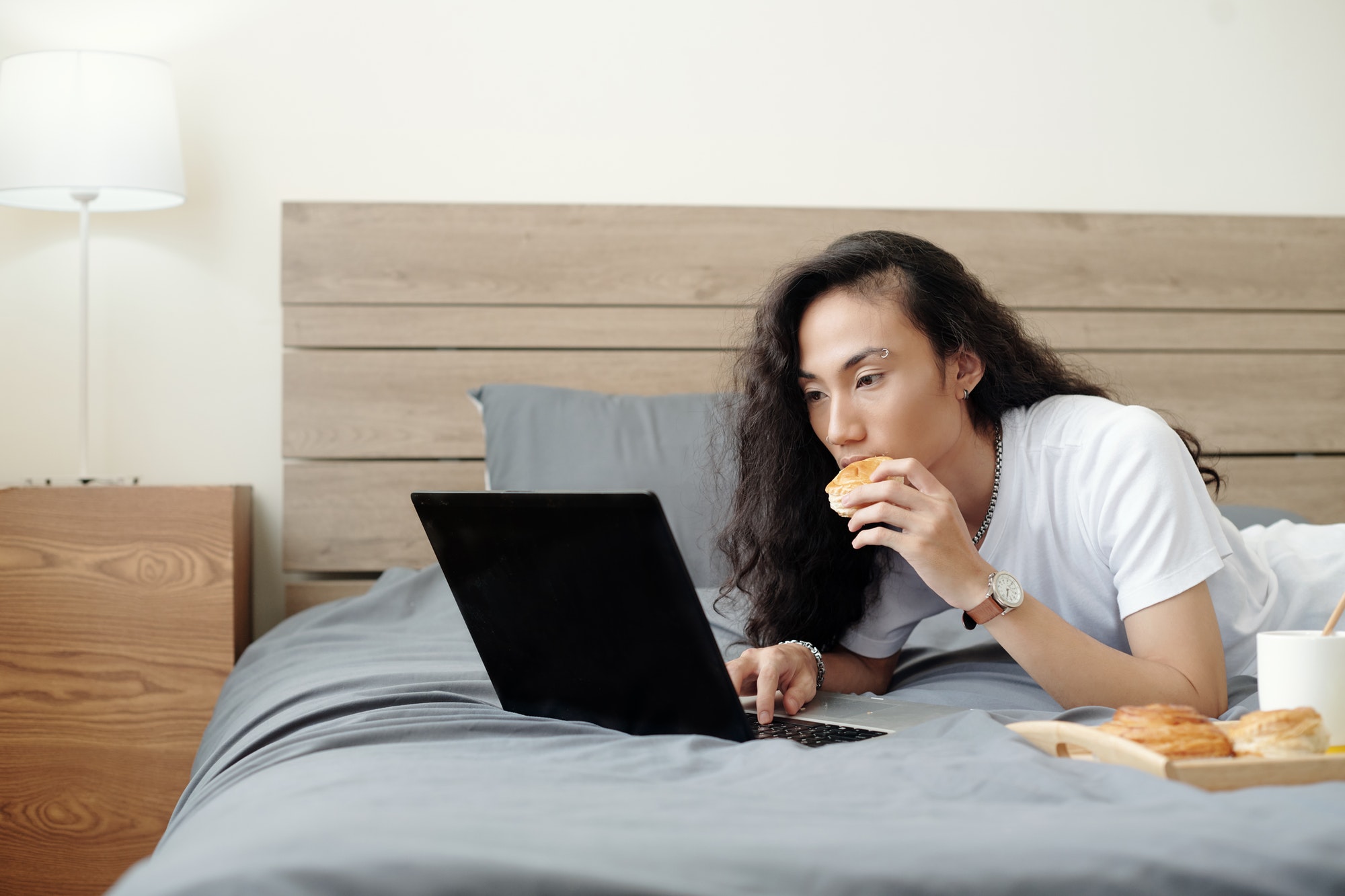 Man Watching Tutorial on Laptop