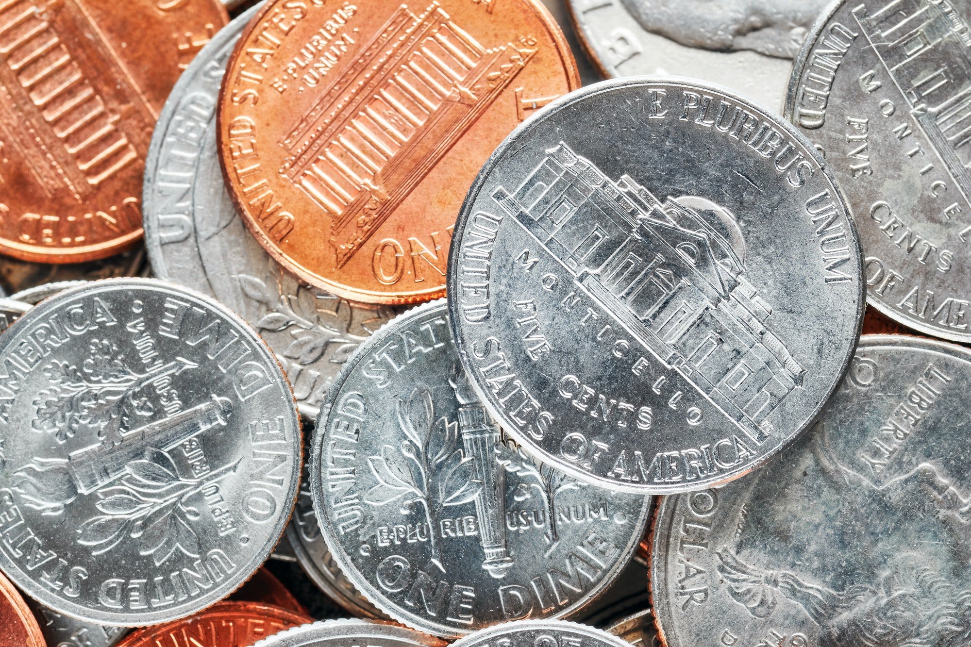 Extreme close up picture of United States dollar coins.