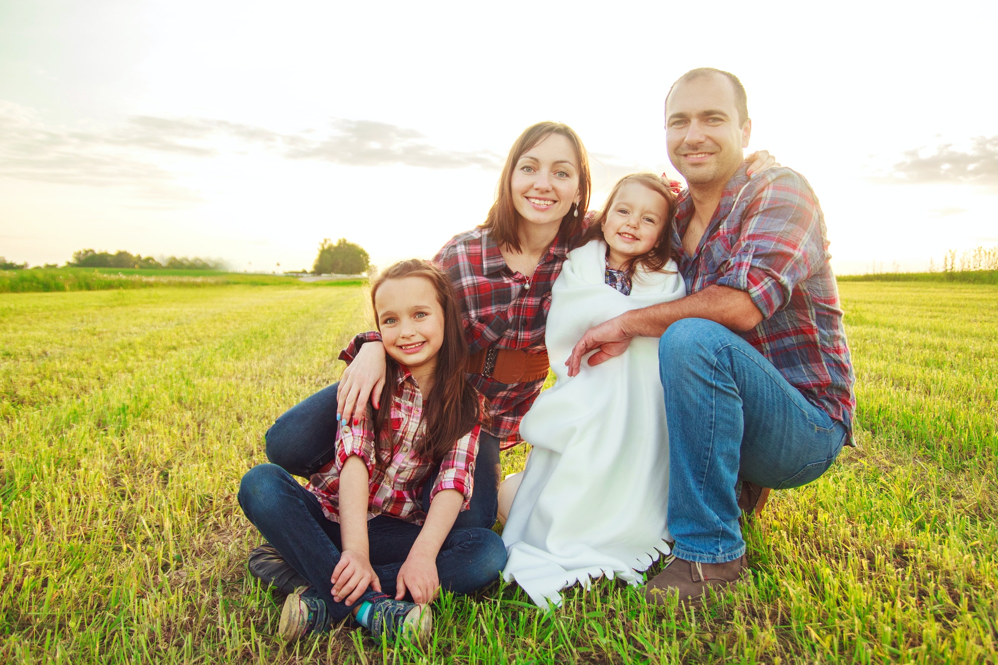 family in the field. Concept of happy family