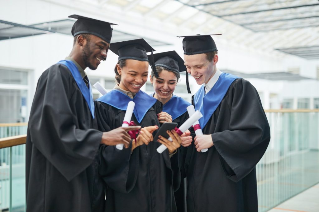 A group of people in graduation caps and gowns