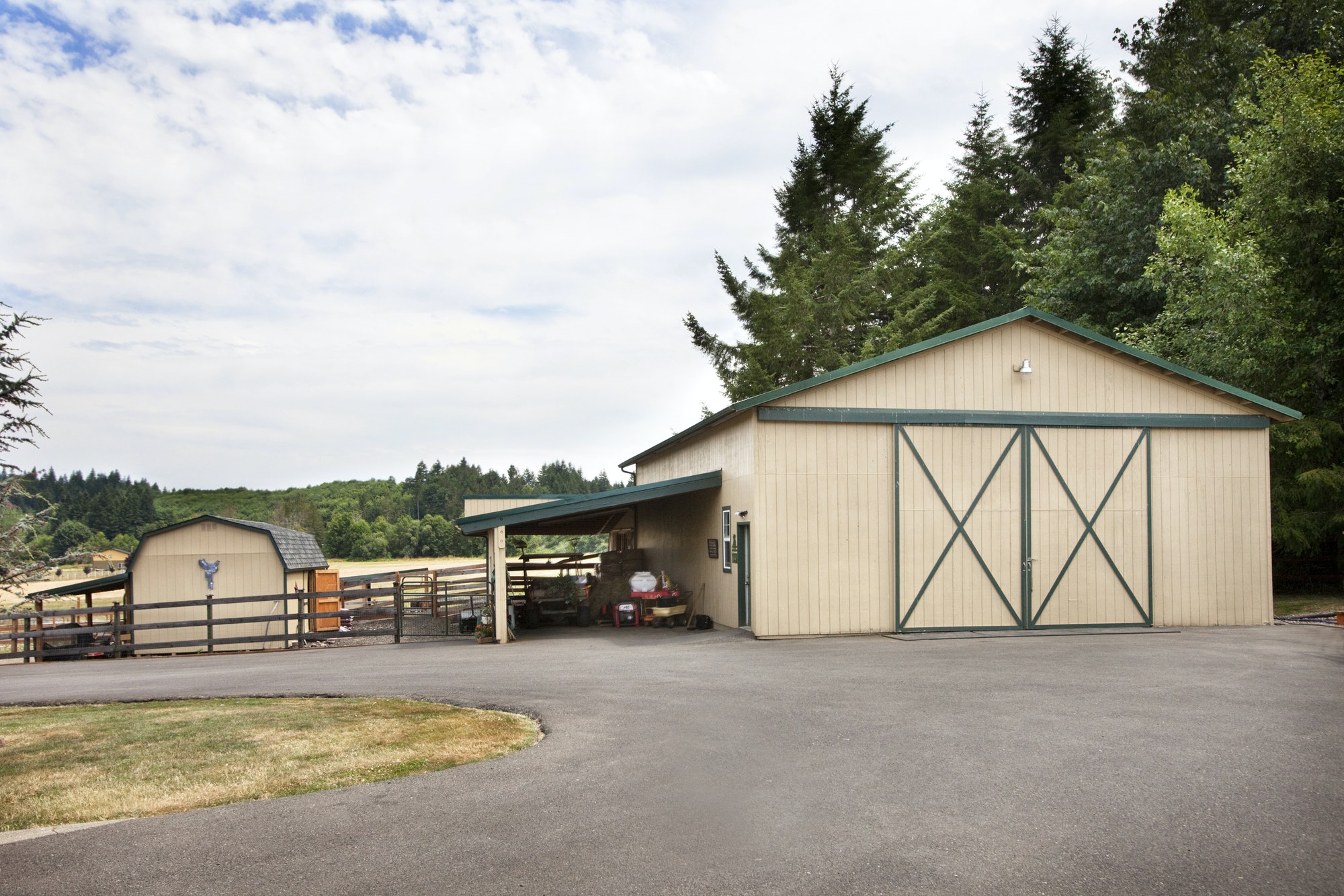 Concrete driveway and barn on ranch